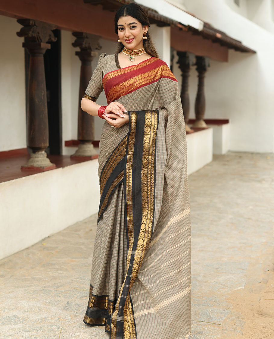 Beige plain chettinad cotton saree, contrast traditional zari rettai pettu ganga jamuna border, striped pallu, and a matching blouse