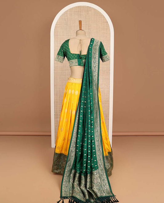 Yellow floral design half saree with contrast zari design border , zari design blouse & floral zari design dhavani