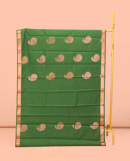 Green Semi-Silk Cotton Saree, Masterfully Woven with Paisley Zari Buttas All Over Its Body, Highlighted by a Zari Border, Pallu of Floral and Paisley Design, and Paired with a Matching Blouse