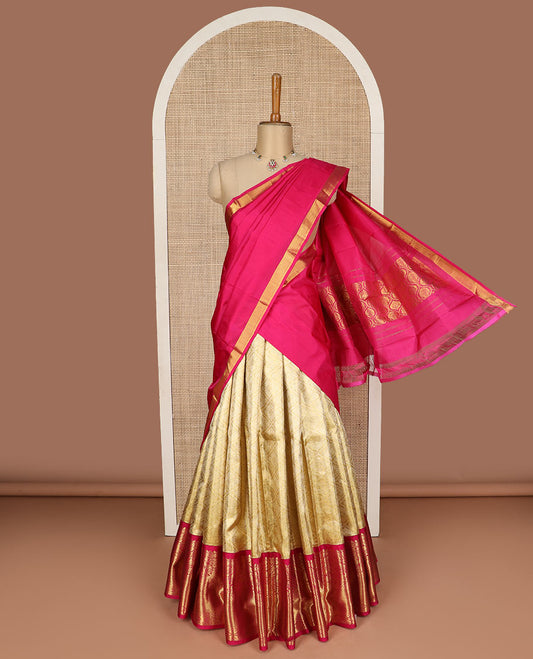 Cream pure silk half saree, jacquard skirt, contrast traditional zari design border, jacquard blouse, and jaal dhavani