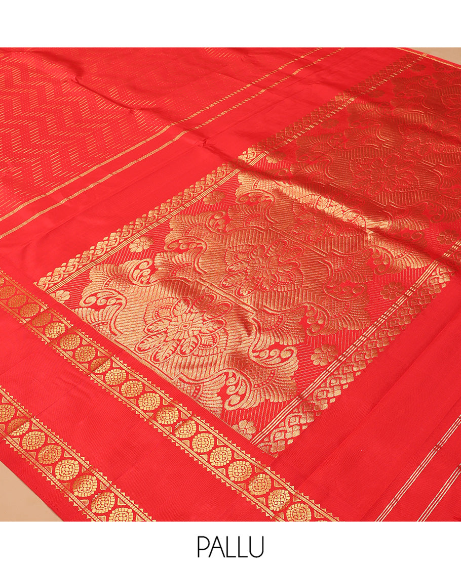 Red Kanchipuram Silk Saree, Woven with Chevron Zari Buttas, Highlighted by a Zari Rettai Pettu Border of Rekku, Banaras, and Chakram Design, Grand Pallu, and No Blouse
