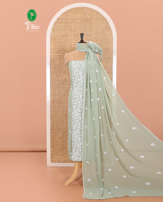 Pista Green Material Chudidar Set Featuring Chikankari-Style Paisley Vine Design, Thread-Embroidered Georgette Top, Subtly Made Plain Santoon Material Bottom, and a Floral Motifs-Embroidered Georgette Scallop-Bordered Dupatta