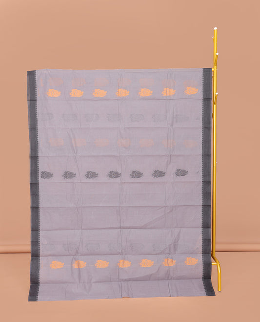 Grey Kanchi Cotton Saree, Decked Up with Buttas All Over Its Body, Complemented by a Contrast Border, Pallu of Floral and Geometric Designs, and Paired with a Matching Blouse