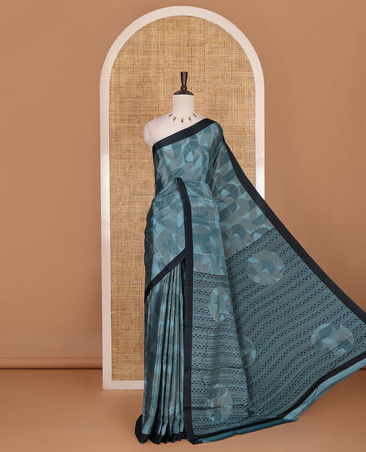 Blue geometric patterns printed Turkey crepe saree, contrast printed piping border, printed pallu, and printed blouse