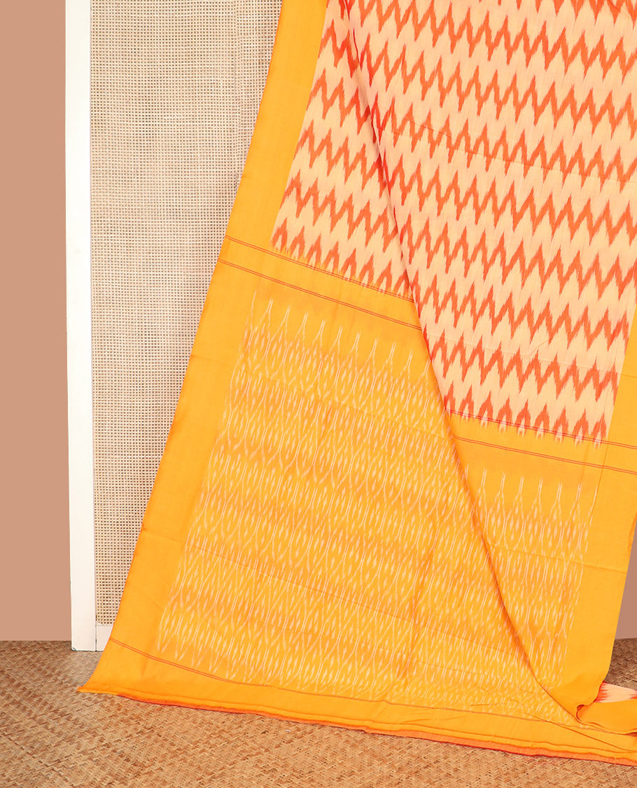 Pale Yellow Ikkat Cotton Saree, Vibrantly Detailed with Ikkat-Style Chevron Stripes All Over Its Body, Complemented by a Contrast Border, Pallu of Ogee Patterns in Ikkat Weave, and No Blouse