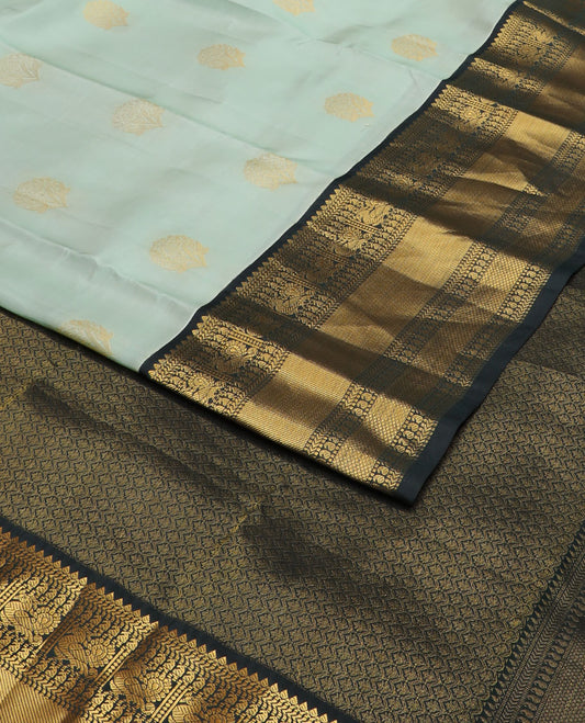 Green zari buttas vasundhara silk mix saree, contrast jaal pallu & border of thilakam mokku,muthu,banaras,manga,mayil & kuyil kann