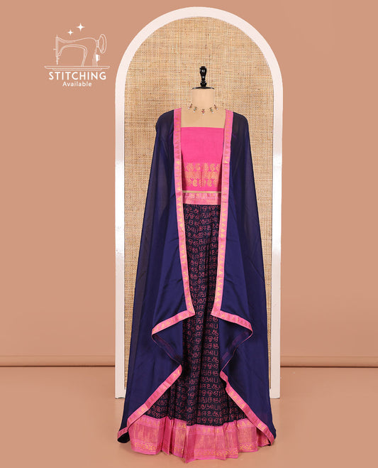 Navy Blue and Pink Printed Sungudi Cotton Half-Saree Showcasing a Skirt Printed with Tamil Letters, Accentuated by a Contrast Traditional Zari Border, a Contrast Blouse, and a Plain Zari-Bordered Dhavani