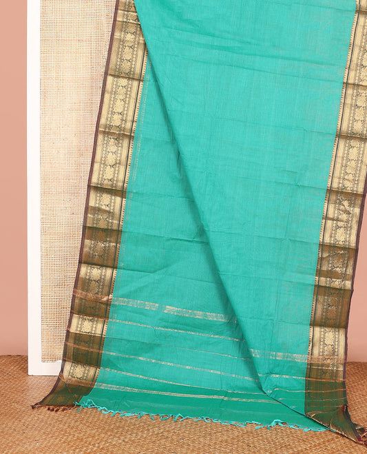Green Plain Chettinad Cotton Saree, Complemented by a Contrast Traditional Zari Design Woven Border, and a Pallu of Zari Stripes