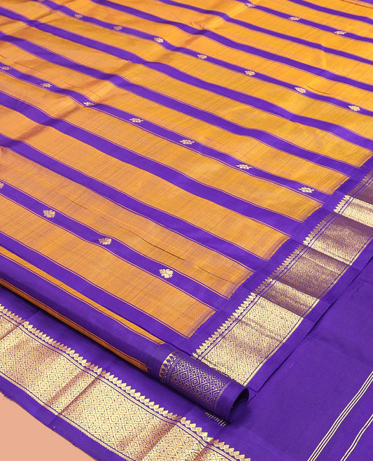 Blue-Mustard Kanchipuram Silk Saree Features Zari Buttas, a Contrast One-Sided Korvai Border of Thilakam Mokku, Banaras, and Jaal Designs, Zari Design Pallu, and No Blouse