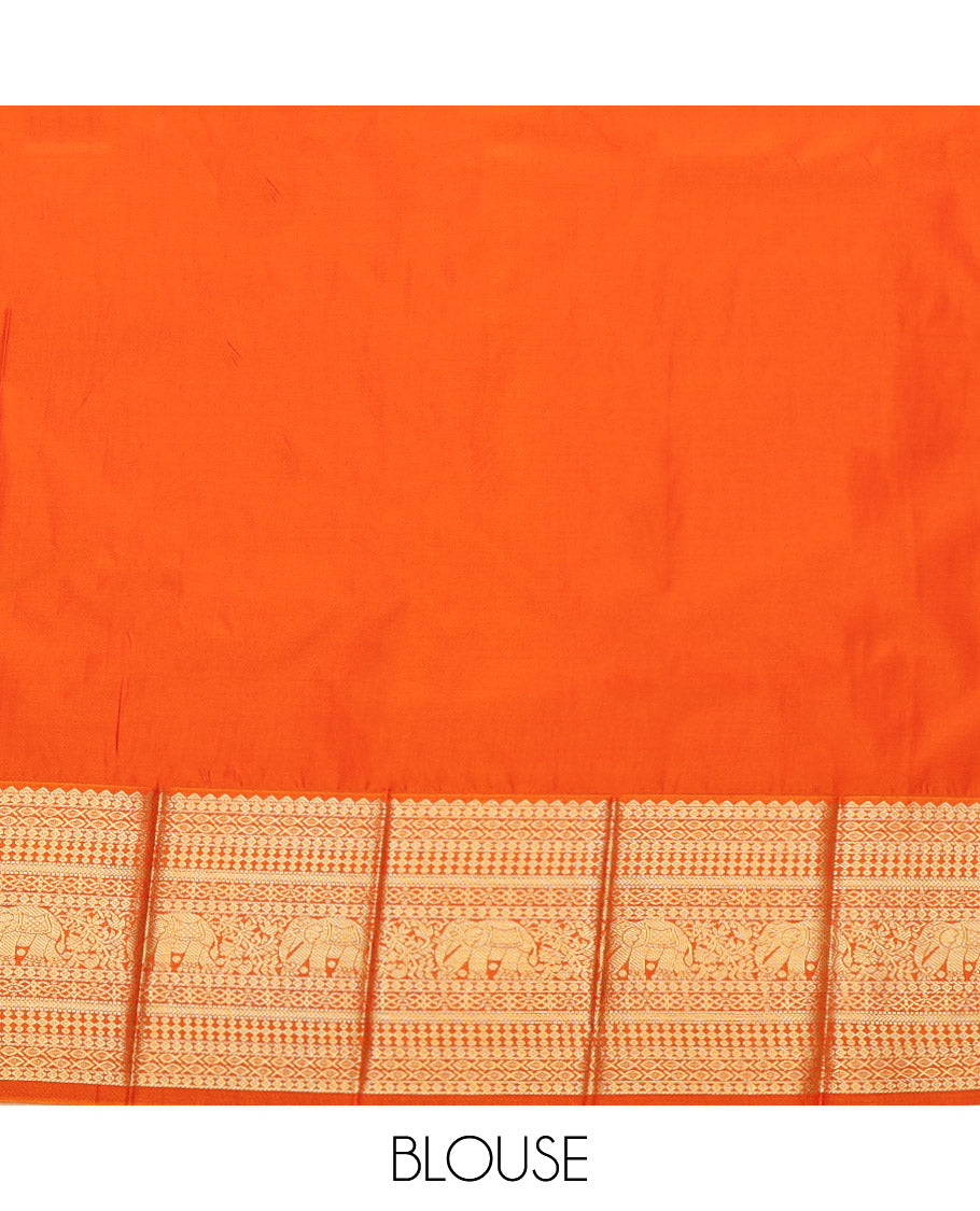 Green Budget Silk Saree Features Kolam Buttas, Complemented by a Contrast Traditional Zari Border, Grand Pallu, and a Contrast Blouse