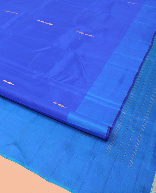 Royal Blue Kanchipuram Silk Saree Adorned with Zari Buttas, Complemented by a Contrast Border of Leaf Zari  Designs, Sparsely Zari Woven Pallu, and Paired with a Contrast Blouse