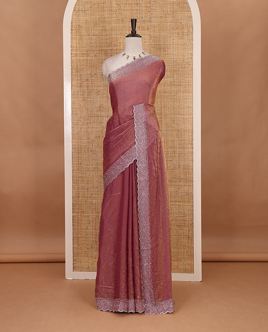 Lavender Swarovski crystal stone embedded fendy chiffon saree, scallop Swarovski stone embroidered border, and contrast plain blouse