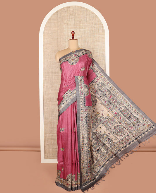 Pink warli printed tussar saree, contrast warli printed border, and pallu of warli motifs print