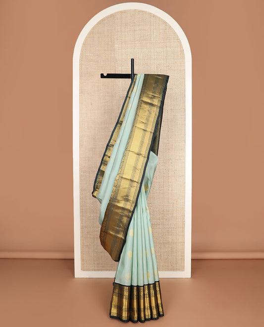 Green zari buttas vasundhara silk mix saree, contrast jaal pallu & border of thilakam mokku,muthu,banaras,manga,mayil & kuyil kann