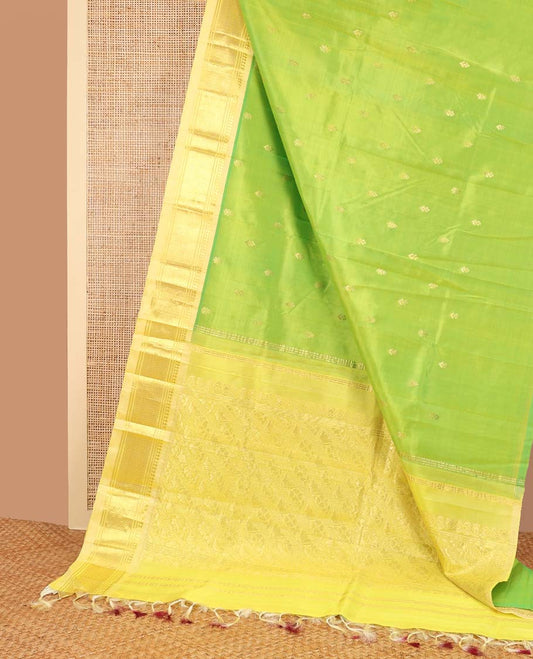Light green floral buttas kancheepuram silk saree with contrast zari designb order & floral striped design pallu