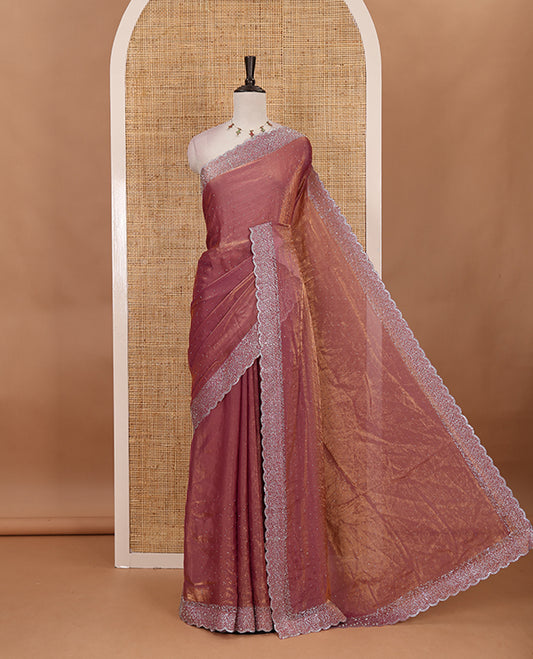 Lavender Swarovski crystal stone embedded fendy chiffon saree, scallop Swarovski stone embroidered border, and contrast plain blouse