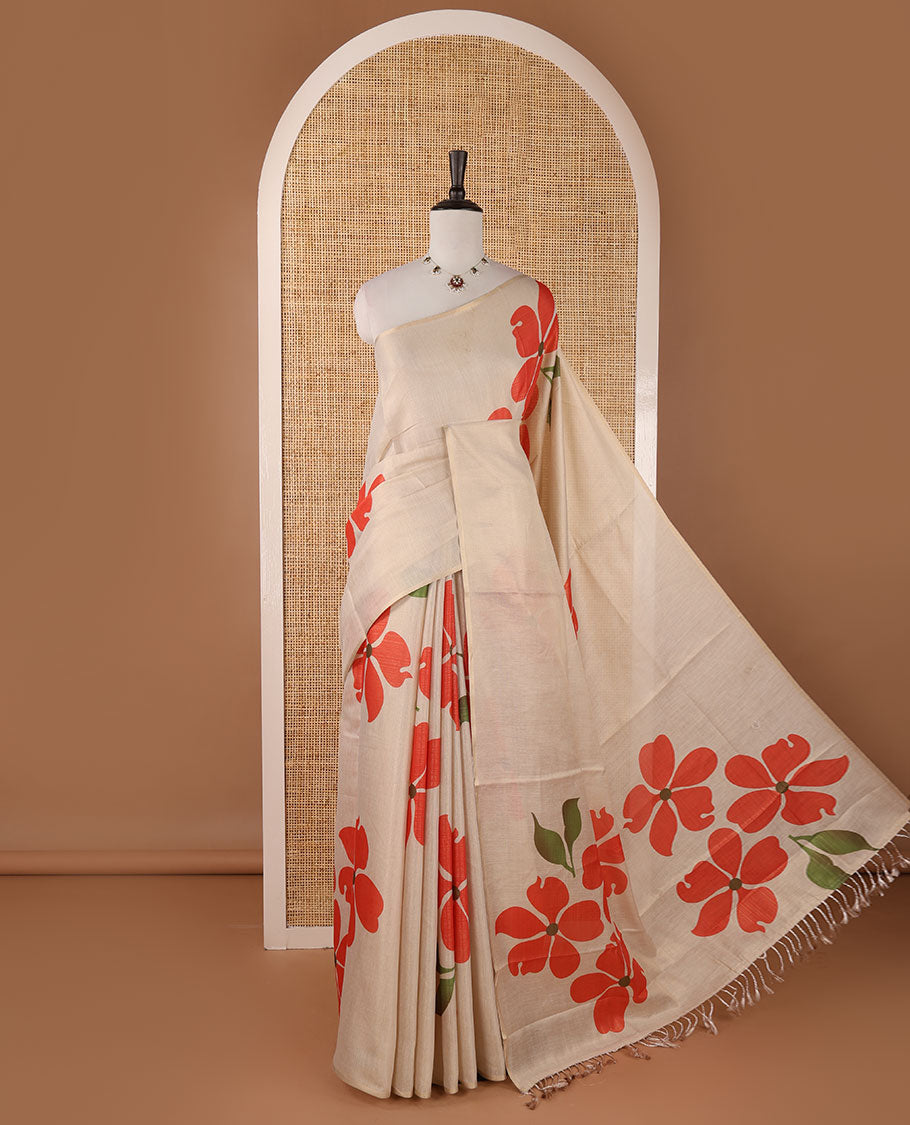 Borderless cream printed onam tissue silk saree features rust color five-petal flower & leaf motifs print, matching floral print blouse