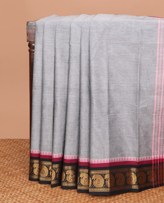 Grey plain Chettinad cotton saree, contrast temple border of zari manga motifs & pink thread striped pallu