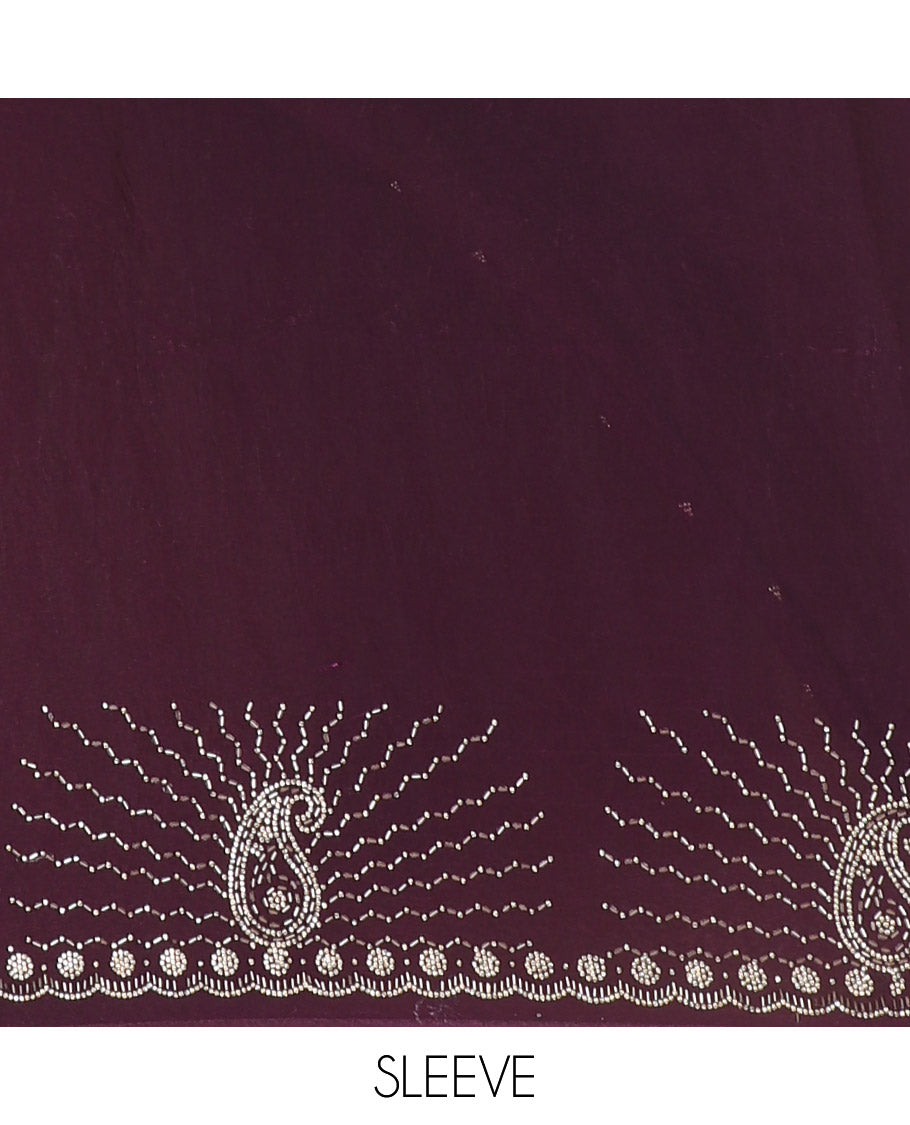 Wine micro-stone work fendy chiffon saree with paisley stone work on its shoulder, a scallop stone work border, a butterfly style pallu, and a matching stone work blouse