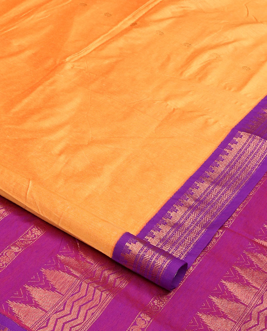 Orange buttas nine-yard cotton saree, contrast traditional zari border, and pallu steeped with traditional designs