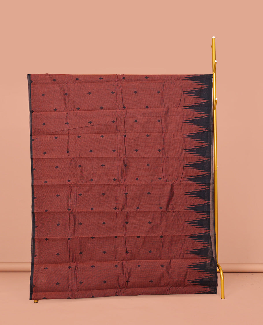 Rust Kanchi Cotton Saree, Enriched with Buttas on Its Body, Complemented by a Contrast Temple Border, a Pallu of Intricate Designs, and Paired with a Contrast  Blouse