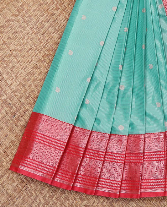 Blue Budget Silk Saree, Subtly Sparkled with Stripes and Buttas on Its Body, Complemented by a Contrast Traditional Zari Design Border, Grand Jaal-Patterned Pallu, and Paired with a Contrast Blouse
