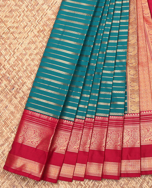 Blue Budget Silk Saree, Bedecked with Zari Stripes on Its Body, Complemented by a Contrast Traditional Zari Designs Woven Rettai Pettu Border, Grand Pallu, and Paired with a Contrast Blouse