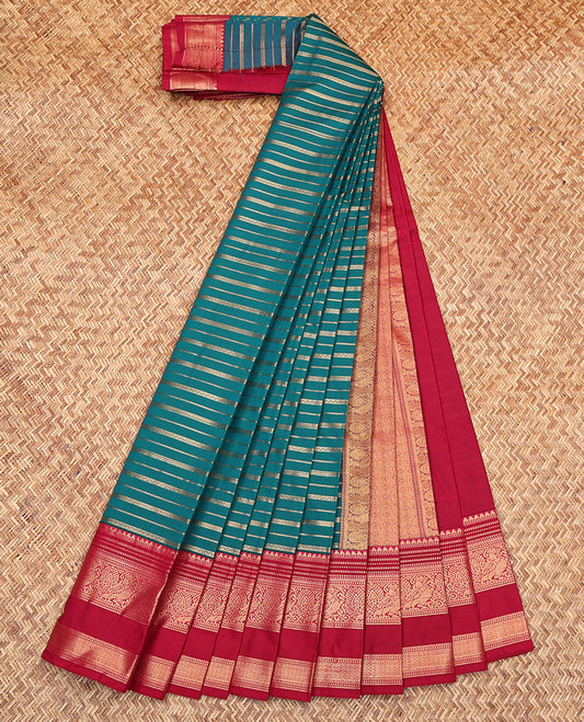 Blue Budget Silk Saree, Bedecked with Zari Stripes on Its Body, Complemented by a Contrast Traditional Zari Designs Woven Rettai Pettu Border, Grand Pallu, and Paired with a Contrast Blouse