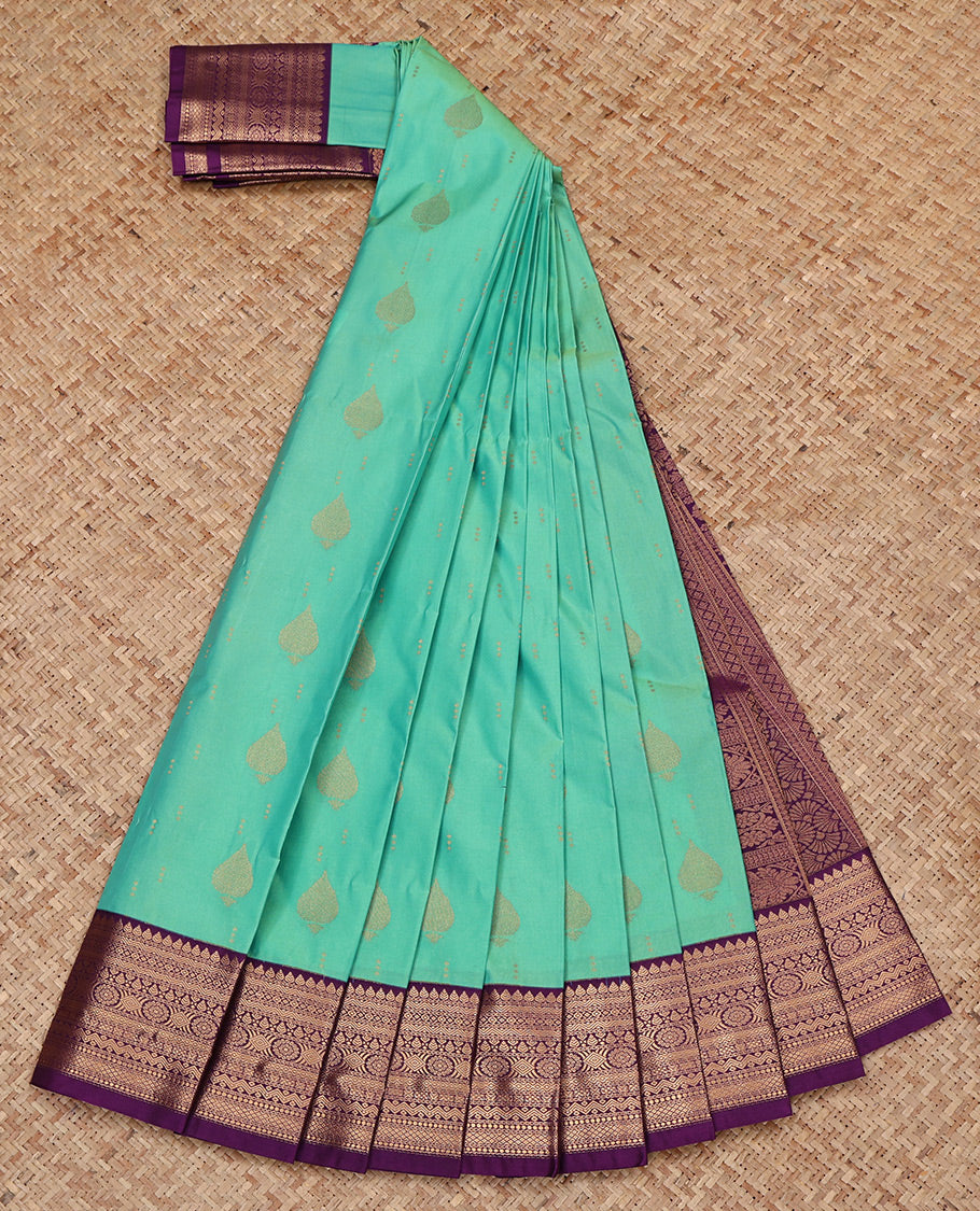 Turquoise Budget Silk Saree, Woven with Zari Buttas All Over Its Body, Complemented by a Contrast Traditional Zari Design Border, Grand Pallu, and Paired with a Contrast Blouse