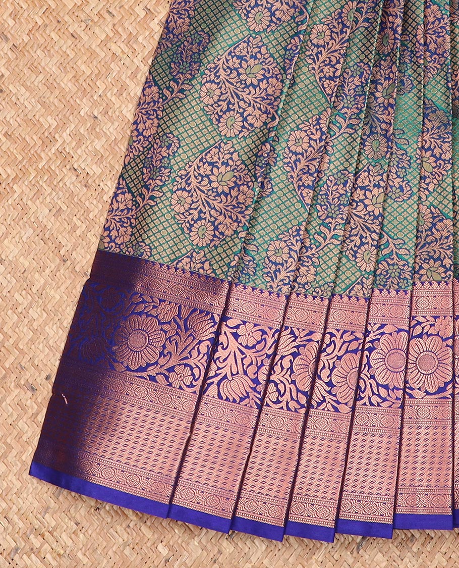 Green jacquard gift saree, contrast traditional zari border, and pallu of thilakam designs