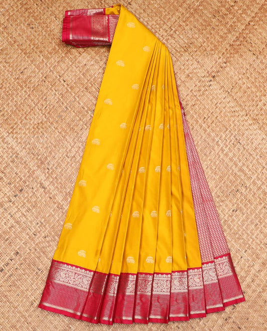 Yellow elephant motifs gift saree, contrast traditional zari design border, and intricate pallu
