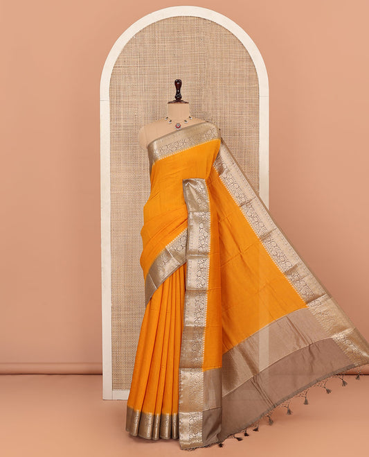 Orange Plain Assam Silk Saree, Complemented by Captivating Contrast Border of Floral Creeper Zari Designs, Zari Striped Pallu, and Paired with a Contrast Blouse