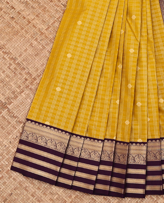 Yellow Budget Silk Saree, Mesmerized with Zari Buttas and Checks All Over Its Body, Complemented by a Contrast Traditional Zari Design Border of Peacocks, Opulently Embellished Pallu, and Paired with a Contrast Blouse