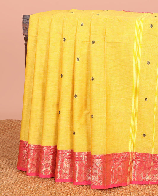 Yellow Chettinad Cotton Saree Adorned with Paisley Buttas, Complemented by a Contrast Traditional Zari Design Woven Border, and a Pallu of Stripes and Paisley Designs