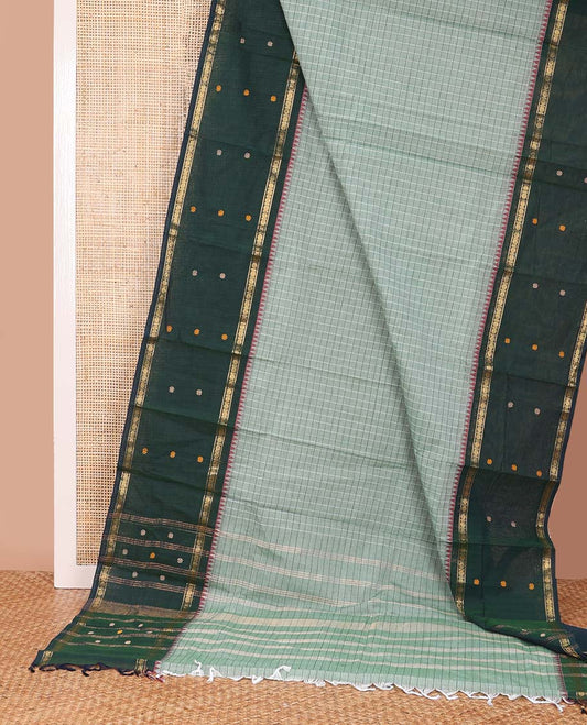 Navy blue checked chettinad cotton saree, contrast ganga jamuna temple border of flower motifs, and striped pallu