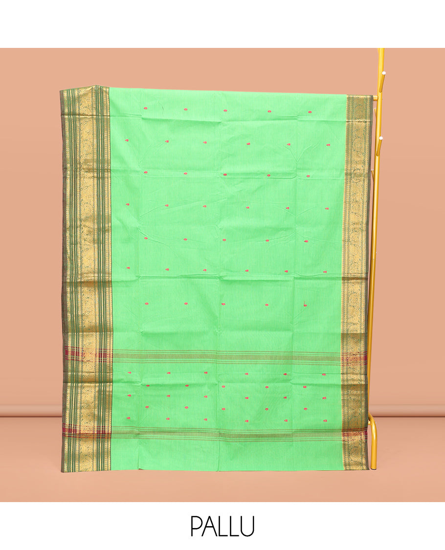 Green Chettinad Cotton Saree, Detailed with Buttas All Over Its Body, Complemented by a Contrast Traditional Zari Design Border, Pallu of Stripes and Buttas, and Paired with a Matching Blouse