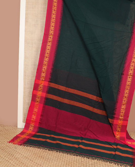 Deep forest green plain design Kadhi cotton saree, contrast star & temple motifs thread border & striped pallu