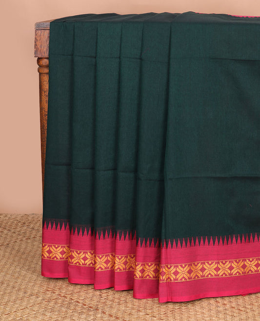 Deep forest green plain design Kadhi cotton saree, contrast star & temple motifs thread border & striped pallu