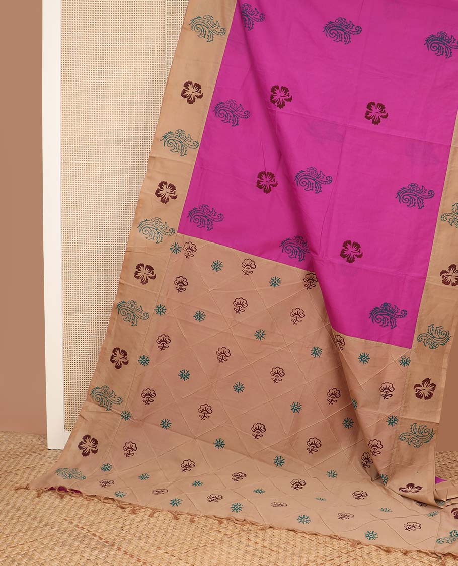 Rani pink motifs printed poly cotton saree, contrast floral-theme block printed border, and butta enclosed jaal pallu