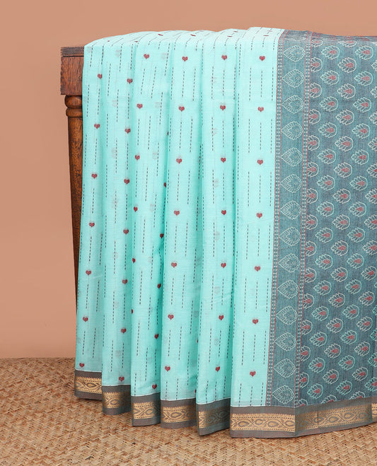 Blue dotted stripes, and heart buttas kanchi cotton saree, contrast zari border, and thilaka motifs steeped pallu