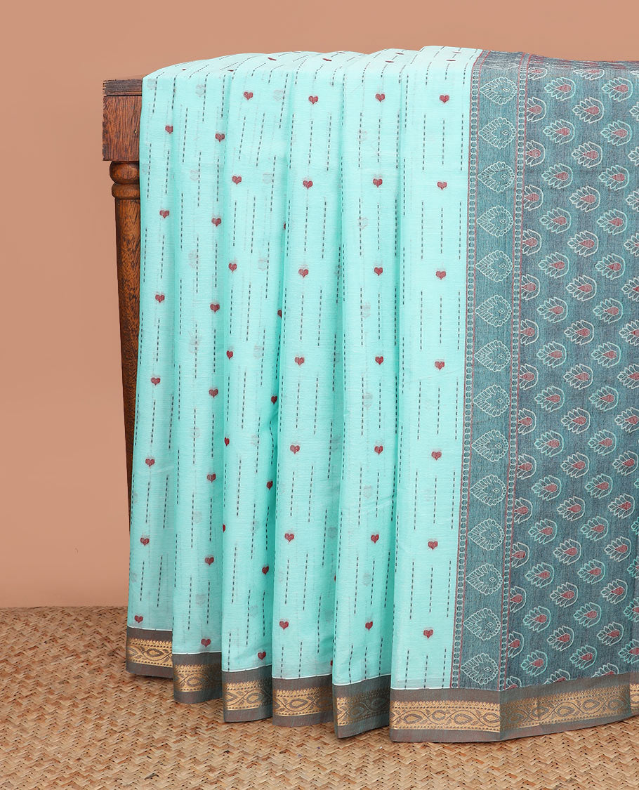 Blue dotted stripes, and heart buttas kanchi cotton saree, contrast zari border, and thilaka motifs steeped pallu
