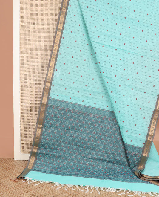 Blue dotted stripes, and heart buttas kanchi cotton saree, contrast zari border, and thilaka motifs steeped pallu