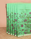 Green floral vine and Pichwai cow printed chirala cotton saree, plain border, and contrast floral printed pallu