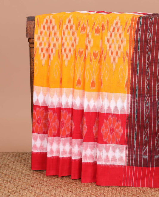 Multi-color floral and geometric patterned ikkat cotton saree, contrast plain border, and pallu of ikkat design