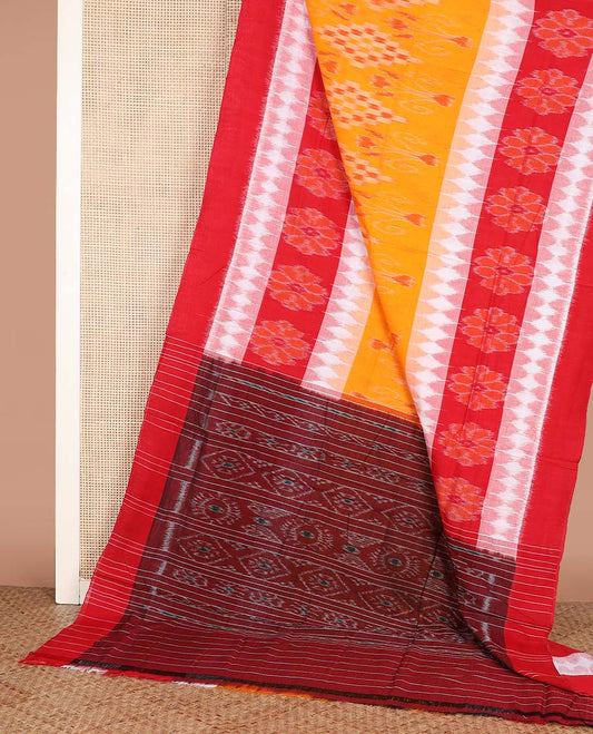 Multi-color floral and geometric patterned ikkat cotton saree, contrast plain border, and pallu of ikkat design