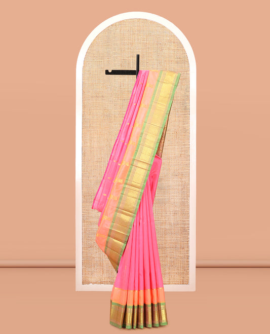 Pink Kanchipuram Silk Saree, Decorated with Zari Buttas, Complemented by a Contrast Border of Panner Sombu, Banaras, Muthu, and Jaal Design, Grand Pallu, and No Blouse
