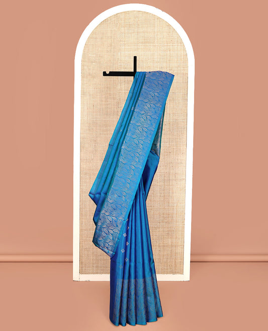 Blue Mayuri Soft Silk Saree, Subtly Sparkled With Zari Buttas All Over Its Body, Highlighted and Leaf Motifs Woven Border, Grand Pallu and Paired with a Matching Blouse