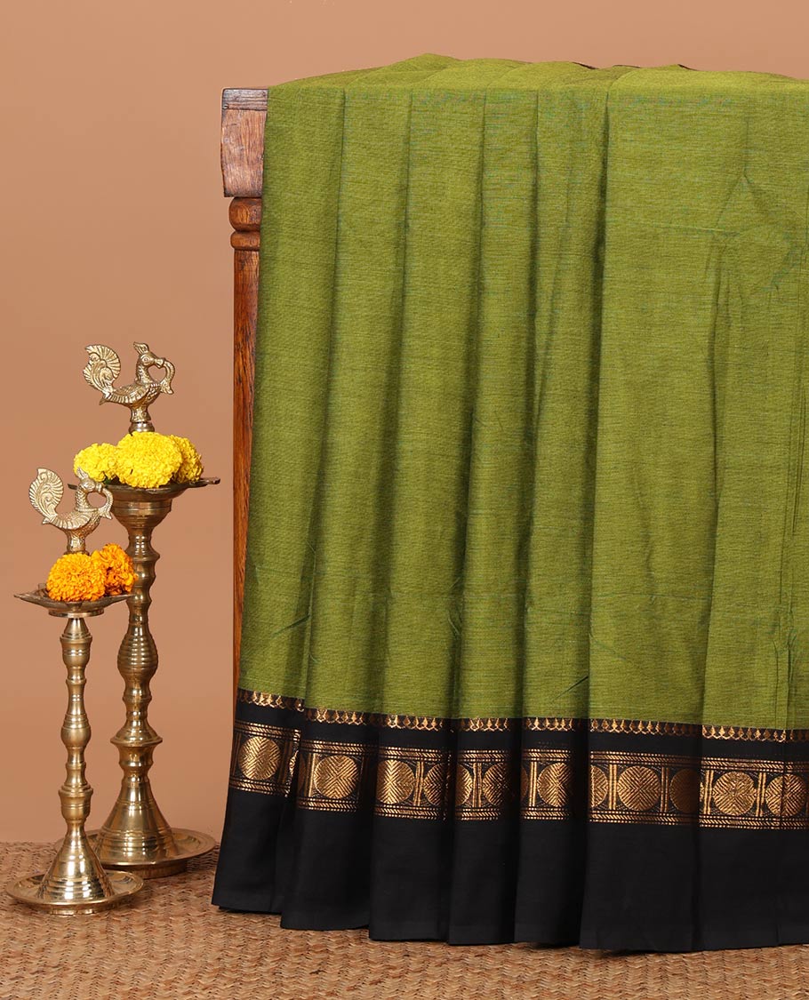Parrot green plain Chettinad cotton saree, contrast zari traditional border of thilakam mokku & rudraksham design & striped pallu