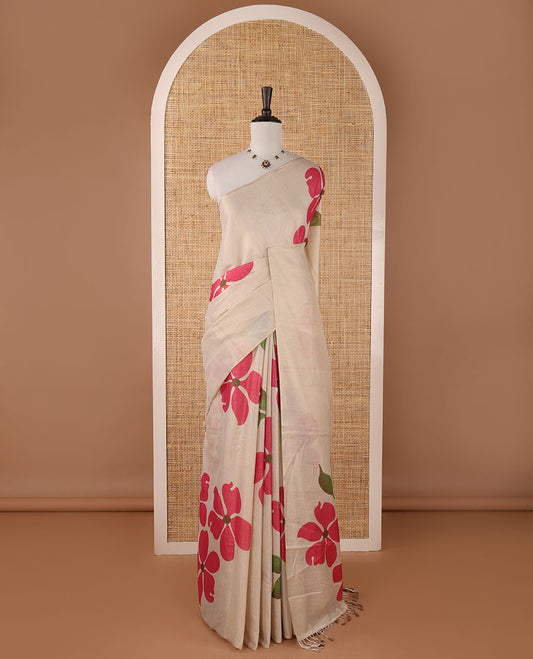 Borderless cream printed onam tissue silk saree features hot pink color five-petal flower & leaf motifs print, matching floral print blouse