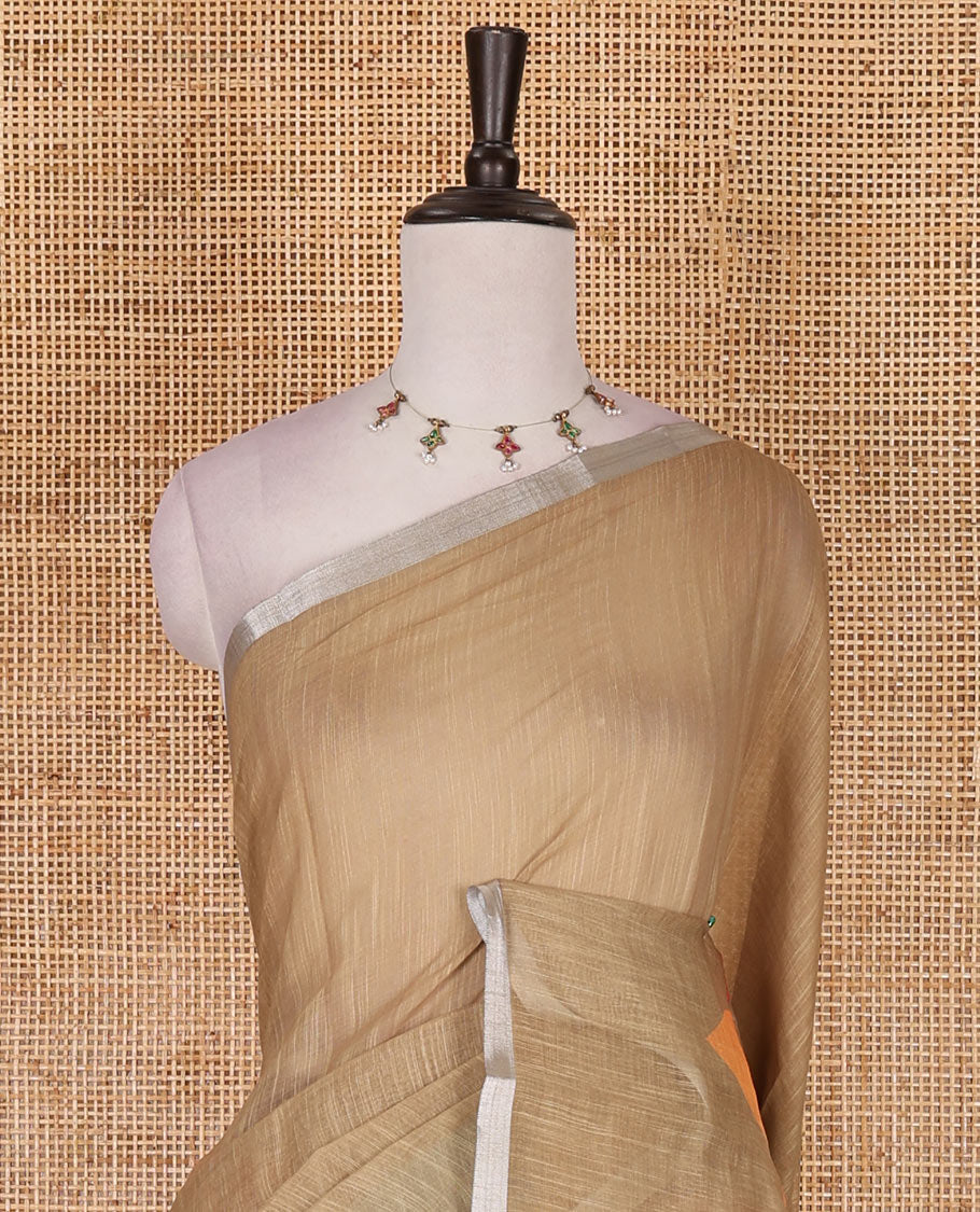Multi-colored plain with triangle motifs linen cotton saree, silver zari border, plain with tassels, and a contrast silver zari bordered blouse